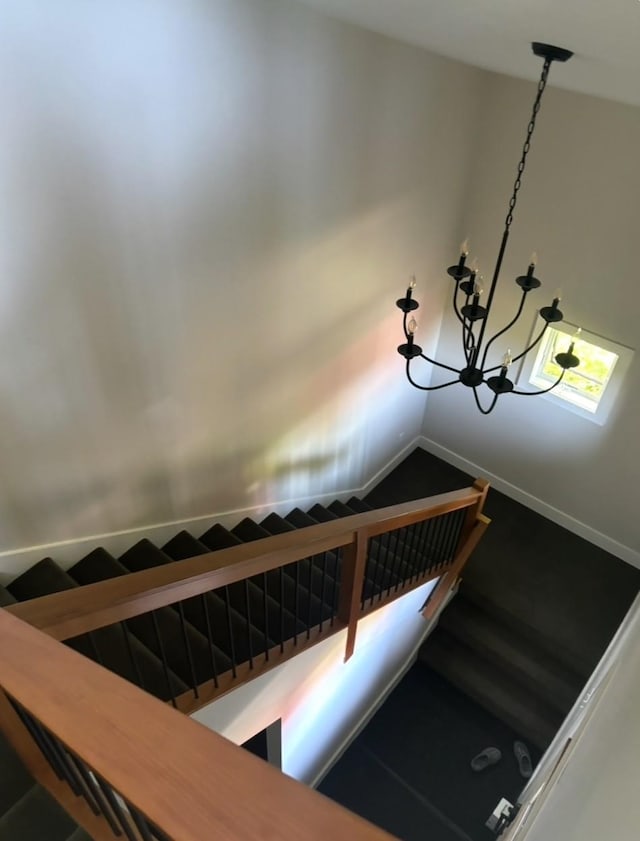 1186 Pucker St Unit 1.5Acres, Stowe, VT 05672 - stairs with a chandelier and baseboards