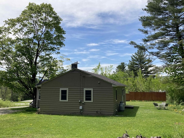 261 Vt 15 E Rd, Hyde Park, VT 05655 - view of side of home with a chimney