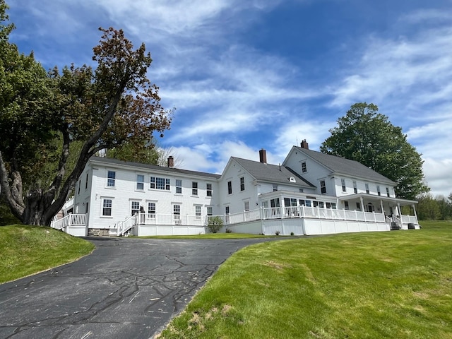 959 Presidential Hwy, Jefferson, NH 03583 - view of front of house with a chimney and a front lawn