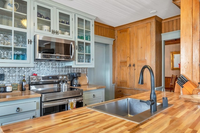 959 Presidential Hwy, Jefferson, NH 03583 - kitchen with butcher block countertops, appliances with stainless steel finishes, and a sink