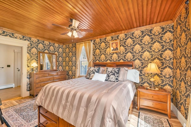 959 Presidential Hwy, Jefferson, NH 03583 - bedroom with wallpapered walls, ornamental molding, light wood-type flooring, baseboards, and baseboard heating