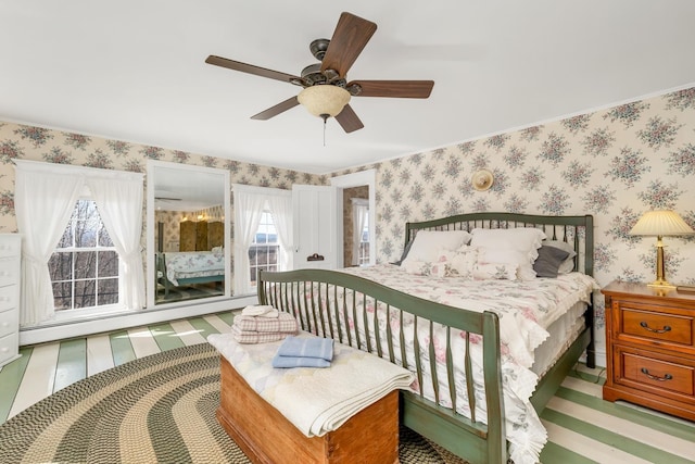 959 Presidential Hwy, Jefferson, NH 03583 - bedroom featuring wallpapered walls, access to exterior, and ceiling fan