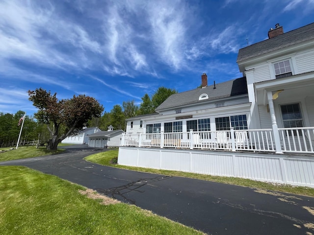 959 Presidential Hwy, Jefferson, NH 03583 - view of side of property featuring a chimney and a garage