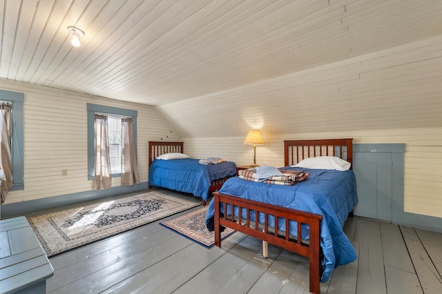 959 Presidential Hwy, Jefferson, NH 03583 - bedroom featuring wood walls, wood-type flooring, lofted ceiling, and wooden ceiling