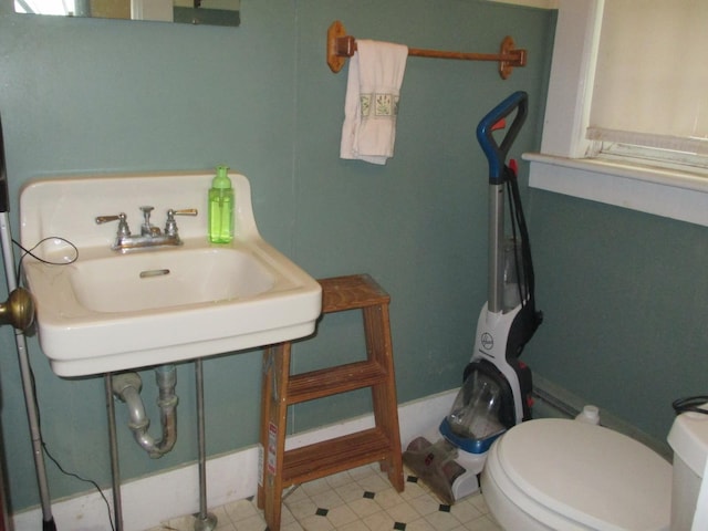 1996 Main St, Bethlehem, NH 03574 - bathroom featuring toilet and a sink