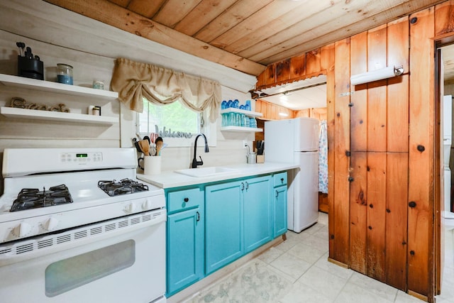 26 Neal Shore Rd, Meredith, NH 03253 - kitchen featuring white appliances, blue cabinetry, a sink, wood ceiling, and open shelves