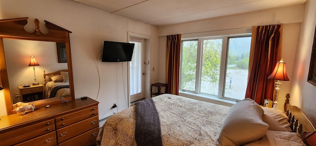 73 Alpine Dr Unit C211, Killington, VT 05751 - bedroom featuring a baseboard heating unit
