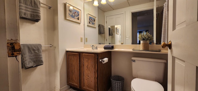 73 Alpine Dr Unit C211, Killington, VT 05751 - bathroom featuring toilet, vanity, and a paneled ceiling