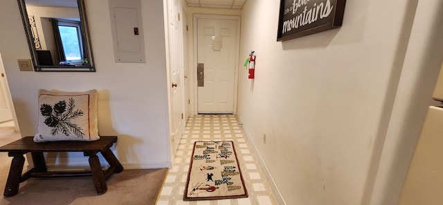 73 Alpine Dr Unit C211, Killington, VT 05751 - hallway featuring electric panel, tile patterned floors, and baseboards