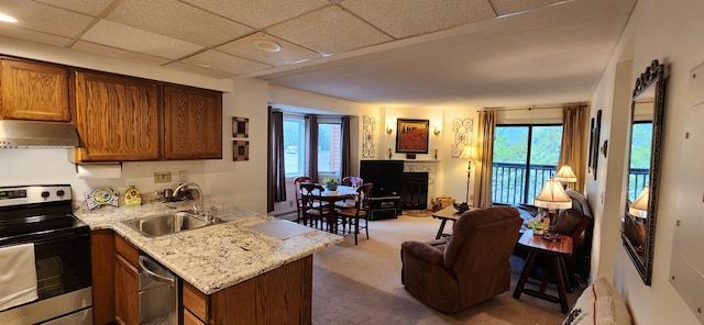 73 Alpine Dr Unit C211, Killington, VT 05751 - kitchen featuring appliances with stainless steel finishes, under cabinet range hood, a sink, open floor plan, and carpet