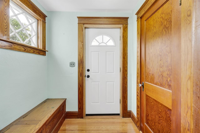 55 Washington St, Rochester, NH 03867 - entrance foyer featuring light wood finished floors and baseboards