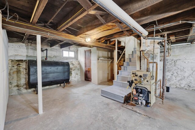 55 Washington St, Rochester, NH 03867 - below grade area with oil tank and stairs