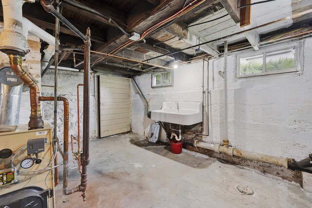 55 Washington St, Rochester, NH 03867 - basement with a sink