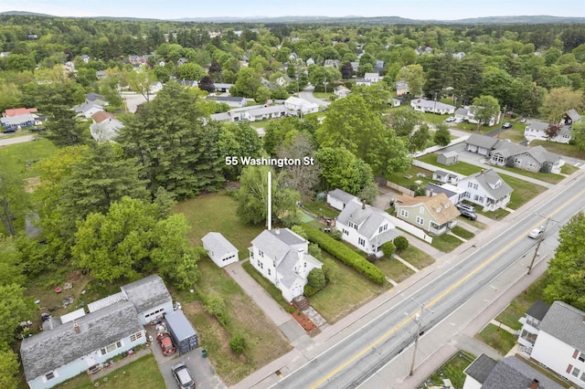 55 Washington St, Rochester, NH 03867 - aerial view of property's location with nearby suburban area