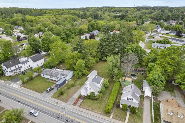55 Washington St, Rochester, NH 03867 - view of property location with nearby suburban area and a forest