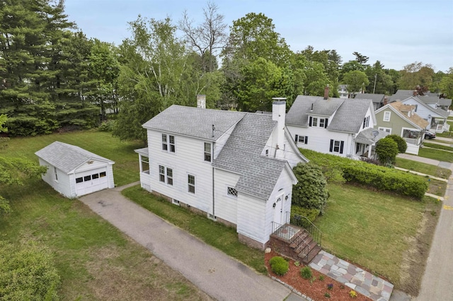 55 Washington St, Rochester, NH 03867 - aerial view of property and surrounding area with a tree filled landscape