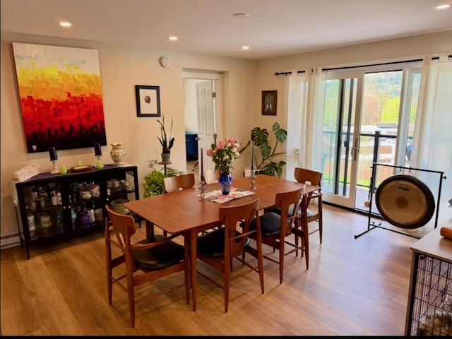 2366 Mountain Rd Unit 3, Stowe, VT 05672 - dining space with wood finished floors, healthy amount of natural light, and recessed lighting