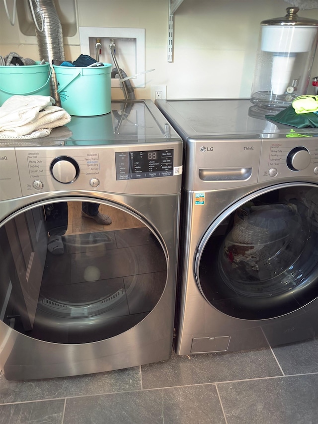 2366 Mountain Rd Unit 3, Stowe, VT 05672 - laundry area with washing machine and clothes dryer
