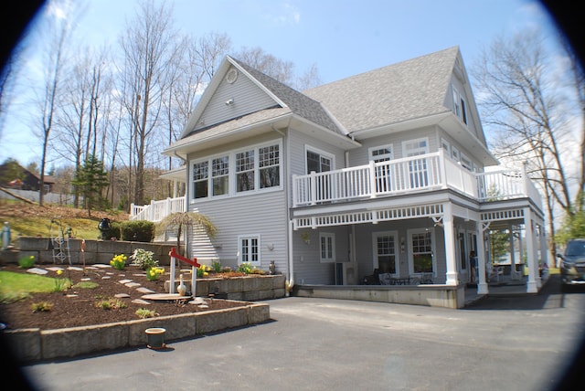 57 Farrants Pt, Newport City, VT 05855 - rear view of house with roof with shingles, a porch, and a balcony