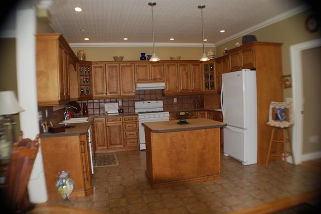 57 Farrants Pt, Newport City, VT 05855 - kitchen featuring white appliances, under cabinet range hood, brown cabinetry, a kitchen island, and recessed lighting
