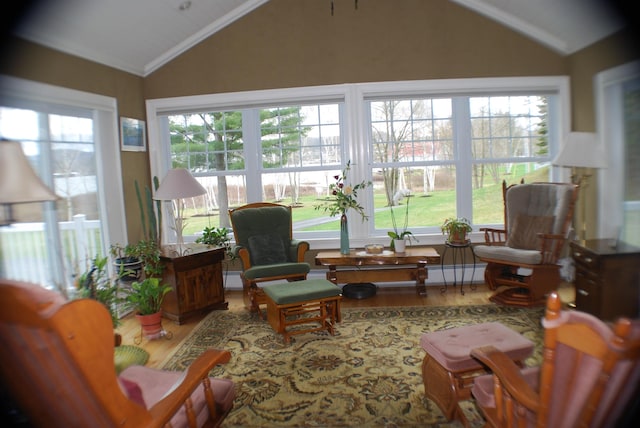 57 Farrants Pt, Newport City, VT 05855 - sunroom featuring vaulted ceiling, plenty of natural light, and a baseboard heating unit