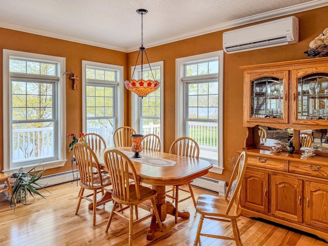 57 Farrants Pt, Newport City, VT 05855 - dining room featuring a wall unit AC, light wood finished floors, a baseboard heating unit, and ornamental molding
