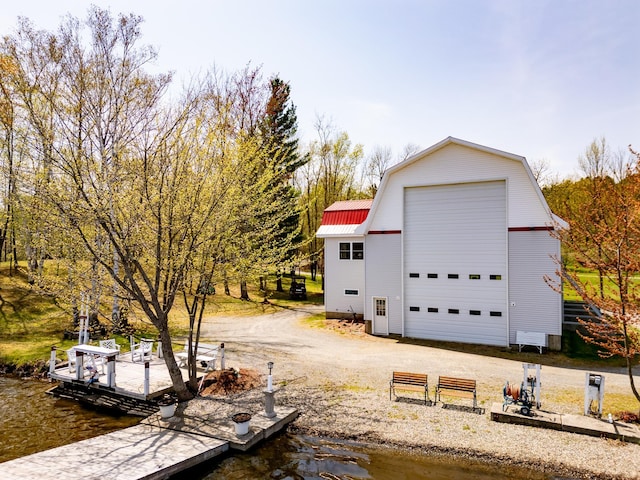 57 Farrants Pt, Newport City, VT 05855 - detached garage featuring a water view and driveway
