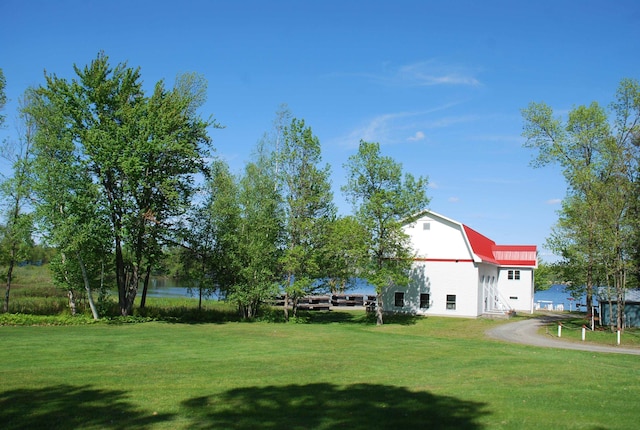 57 Farrants Pt, Newport City, VT 05855 - view of green lawn with a barn and an outbuilding