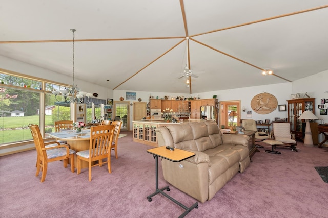 1 Mayhew Tpke, Bridgewater, NH 03222 - living room with light carpet, a chandelier, healthy amount of natural light, and vaulted ceiling