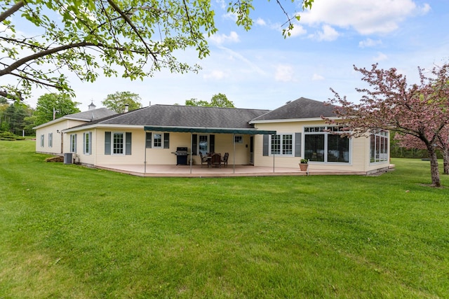 1 Mayhew Tpke, Bridgewater, NH 03222 - rear view of house featuring a lawn and a patio