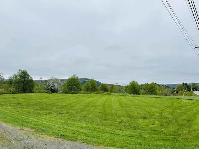 6998 River Rd, Lemington, VT 05903 - view of grassy yard featuring a view of rural / pastoral area