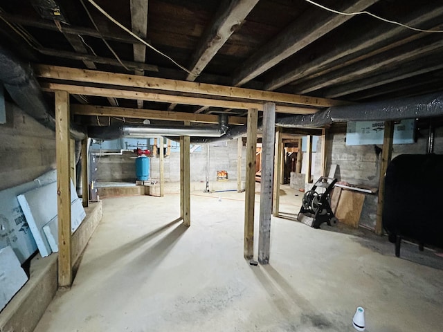6998 River Rd, Lemington, VT 05903 - unfinished below grade area featuring oil tank and a water pressure tank