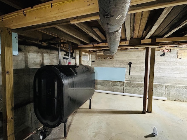 6998 River Rd, Lemington, VT 05903 - unfinished basement featuring oil tank