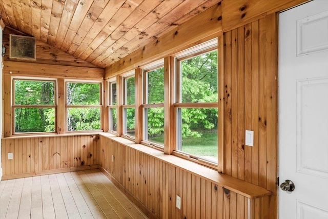 379 Swallow Hill Rd, Pownal, VT 05261 - unfurnished sunroom with wood walls, healthy amount of natural light, vaulted ceiling, hardwood / wood-style floors, and wooden ceiling