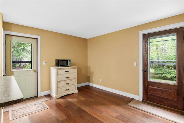 379 Swallow Hill Rd, Pownal, VT 05261 - foyer with plenty of natural light, wood finished floors, and baseboards