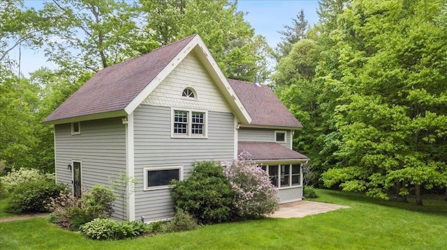 379 Swallow Hill Rd, Pownal, VT 05261 - view of home's exterior with a yard and roof with shingles
