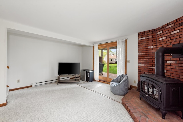11 Village W Dr Unit 5, Bristol, NH 03222 - living area with a wood stove, carpet floors, and baseboards