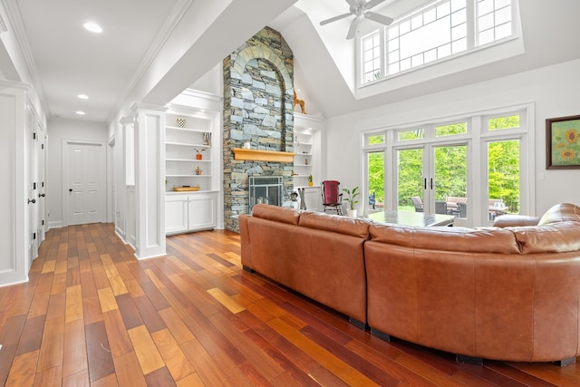 543 Lower Hollow Rd, Dorset, VT 05251 - living room with a fireplace, hardwood / wood-style flooring, ceiling fan, built in shelves, and recessed lighting