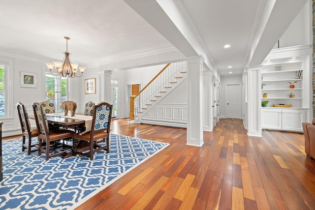 543 Lower Hollow Rd, Dorset, VT 05251 - dining area featuring wood-type flooring, a chandelier, ornamental molding, a baseboard radiator, and recessed lighting