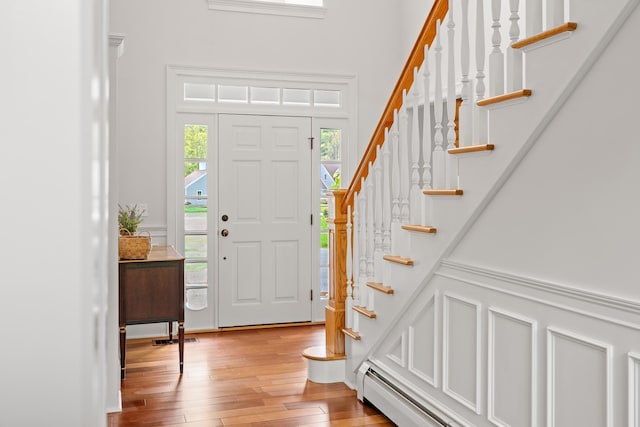 543 Lower Hollow Rd, Dorset, VT 05251 - entryway with stairway and light wood-style flooring