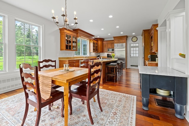 543 Lower Hollow Rd, Dorset, VT 05251 - dining area with hardwood / wood-style floors, healthy amount of natural light, recessed lighting, and a chandelier
