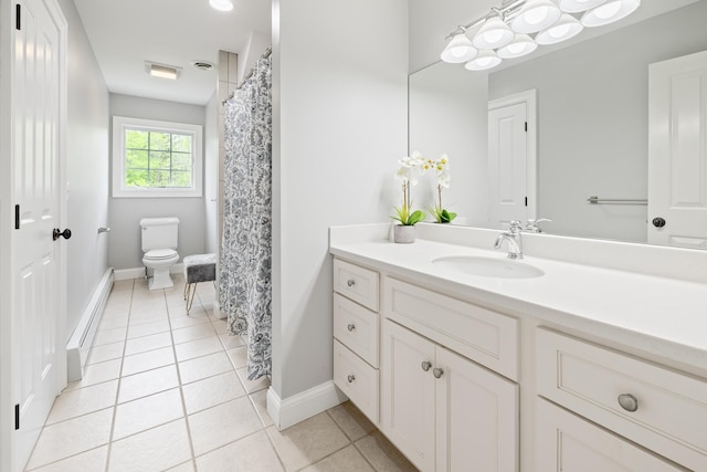 543 Lower Hollow Rd, Dorset, VT 05251 - full bath featuring baseboard heating, vanity, toilet, tile patterned floors, and baseboards