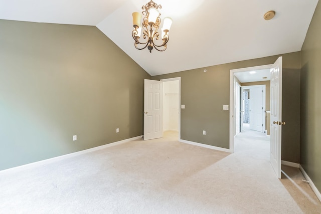 60 Barrington Ave Unit 60, Nashua, NH 03062 - empty room with vaulted ceiling, a chandelier, light colored carpet, a smoke detector, and baseboards