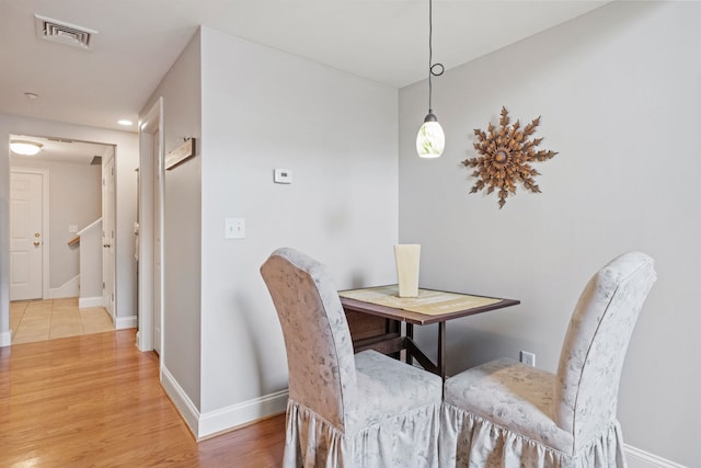 48 Landing Ln Unit 15, Laconia, NH 03246 - dining area with light wood finished floors and baseboards