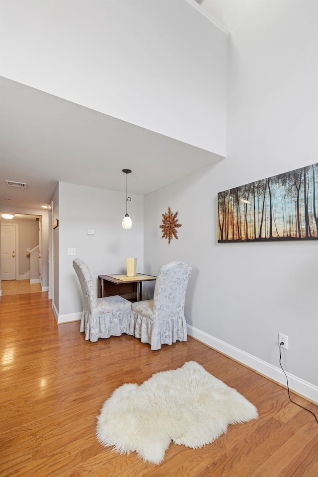 48 Landing Ln Unit 15, Laconia, NH 03246 - dining room featuring baseboards and light wood-style flooring