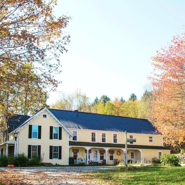 1460 Main St, Waitsfield, VT 05673 - view of front facade featuring covered porch
