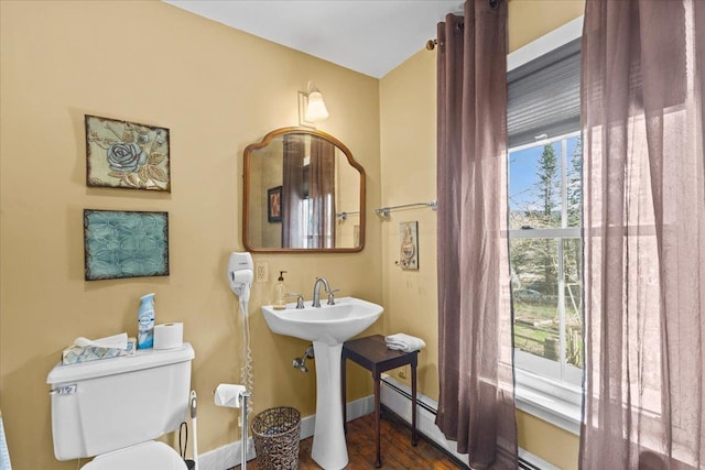 1460 Main St, Waitsfield, VT 05673 - bathroom featuring toilet, wood finished floors, and baseboards