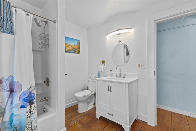1460 Main St, Waitsfield, VT 05673 - bathroom featuring vanity, hardwood / wood-style floors, toilet, and shower / bath combination with curtain