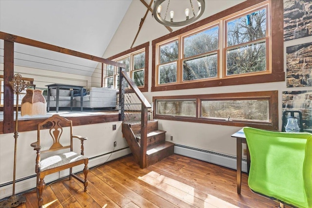1460 Main St, Waitsfield, VT 05673 - sunroom with baseboard heating, a chandelier, and lofted ceiling