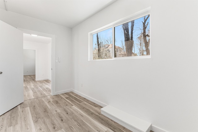 15 Highland Ave, Claremont, NH 03743 - unfurnished room with light wood-style flooring and baseboards